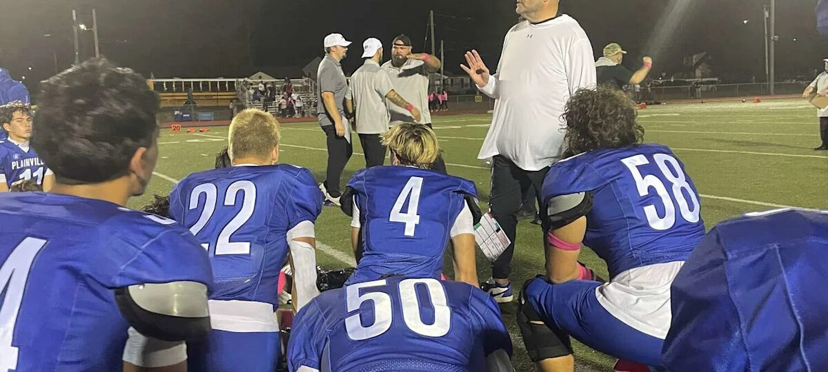 Plainville football stays unbeaten as Abarno and defense deliver dominant win over Tolland