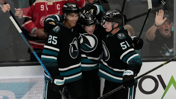 Will Smith scores twice as the Sharks rally from a two-goal deficit to beat the Canucks 3-2