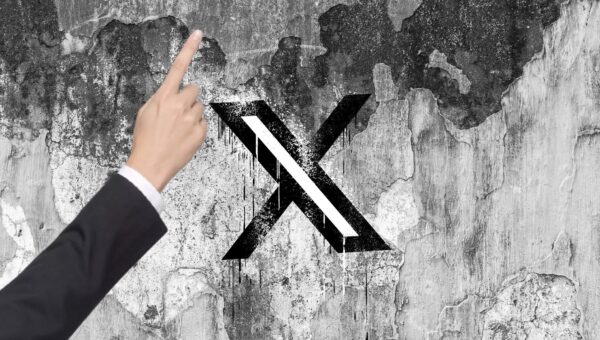 X is nudging users to promote their posts with a pointing hand, and people are confused