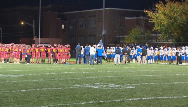 Cornell high school football players take the field for first time since their coach’s death
