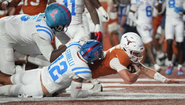 Texas recovers after blowing big lead, hangs on to beat Ole Miss
