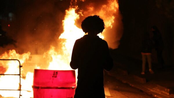 Clashes break out as hundreds of thousands protest in France