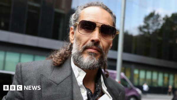 Russell Brand accuser says alleged rape left her afraid she may be pregnant
