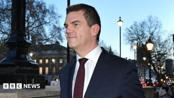 Ex-top official Robbins reaches settlement with government over sacking