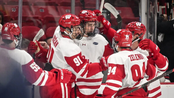 Youngsters lead and learn as Wisconsin opens hockey season with a win