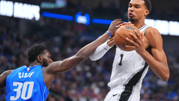 Wembanyama, Harper lead Spurs past short-handed Mavericks 122-106 for their first victory