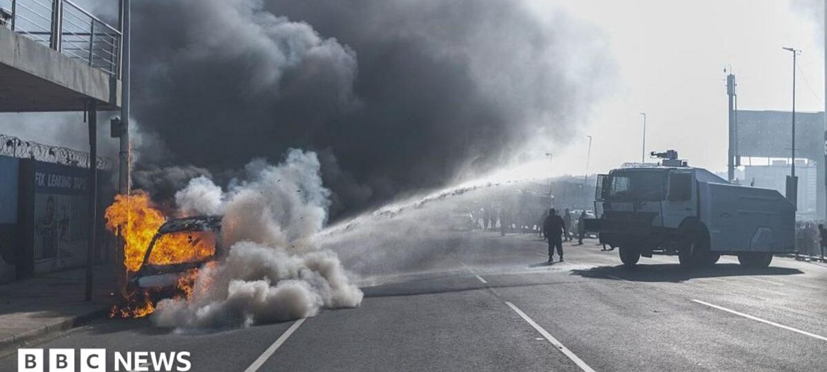 Cars torched and shops looted as anti-migrant violence erupts in South Africa