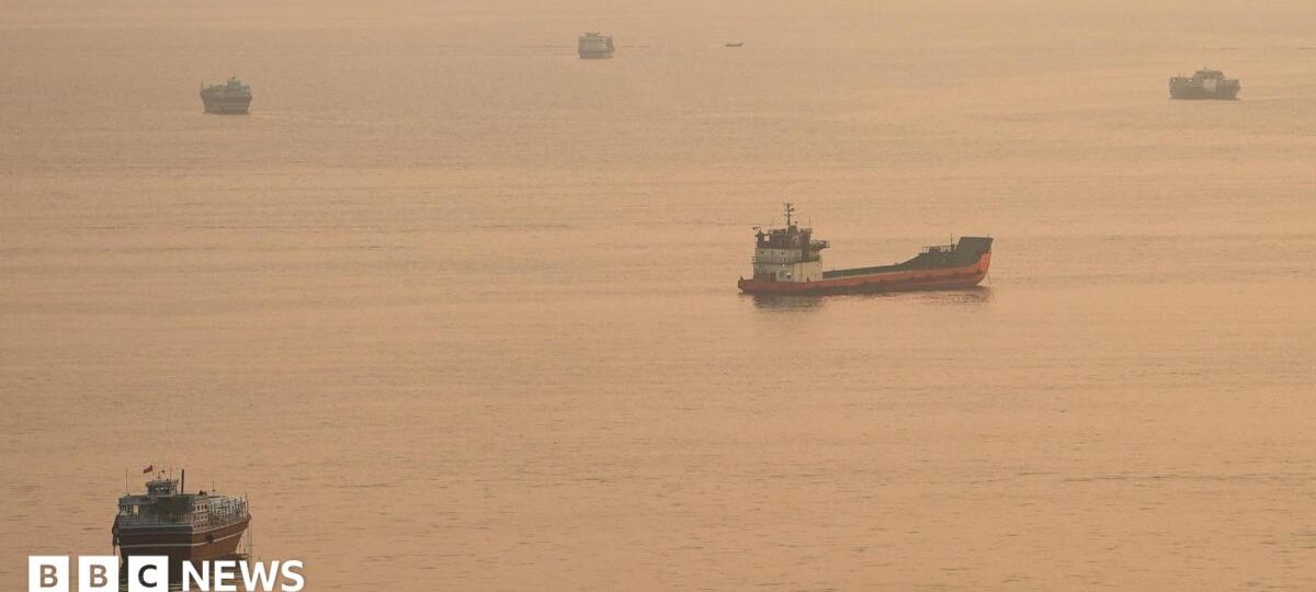 Container ship hit by projectile sinks in Strait of Hormuz, Singapore says