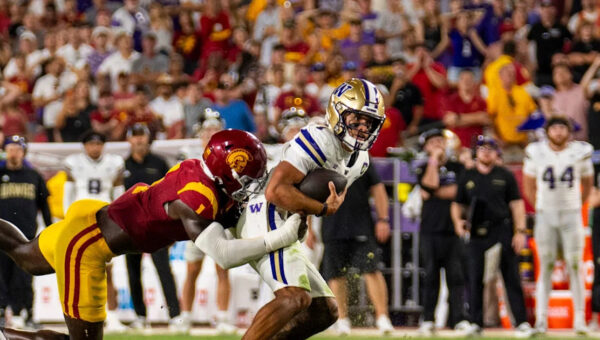 Trojan defense helps USC escape thriller over Washington