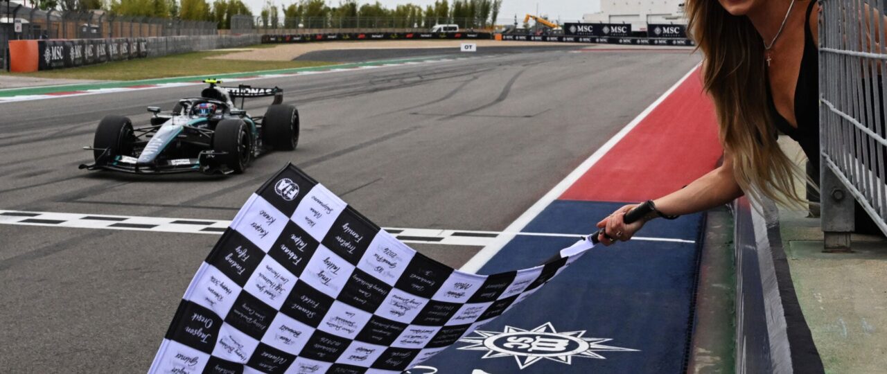 Sophie Cunningham turns heads as chequered flag waver at Formula 1’s United States GP
