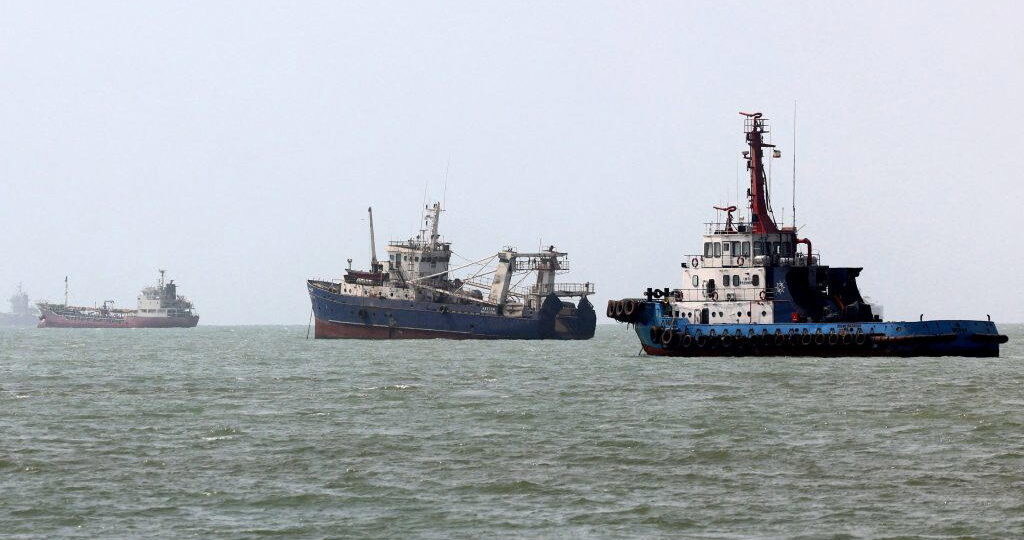 Iran Guards says three tankers on fire after hitting mines in Hormuz