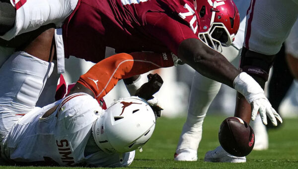 Costly turnovers, penalties turn No. 1 Texas' loss to Oklahoma a case of Red River regret