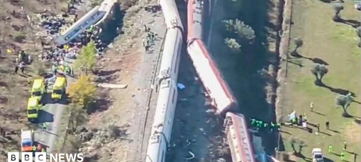 Overturned carriages and makeshift medical tents at crash site