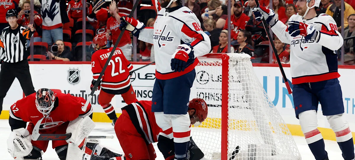 Tuch scores twice in his first game for Washington, helping the Capitals beat the Hurricanes 5-2