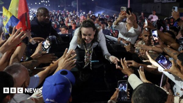 Crowds welcome Venezuela’s María Machado after months in exile