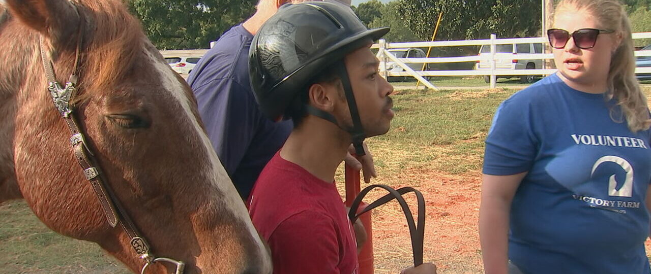 Chancellor Lee Adams prepares for Special Olympics equestrian competition