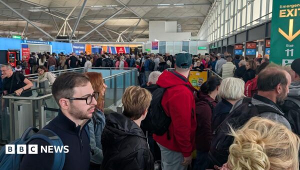 Long queues after power surge at Stansted Airport