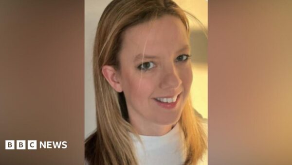 Woman found dead in home named as GP