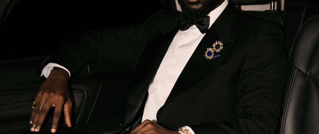 Adekunle Gold Brings Black-Tie Style & Afrobeats to the Ballon d’Or