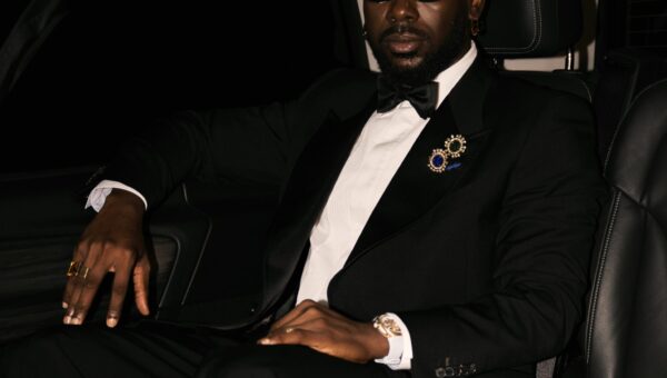 Adekunle Gold Brings Black-Tie Style & Afrobeats to the Ballon d’Or