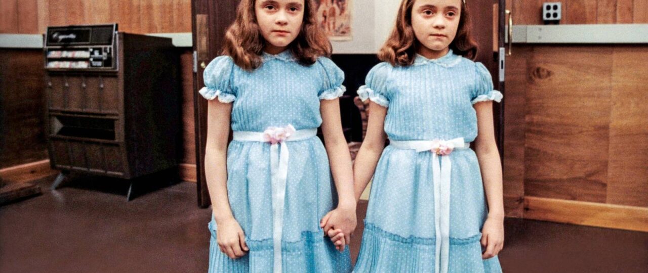 The Shining's Twins Explained & Why The Movie Changed The Grady Sisters