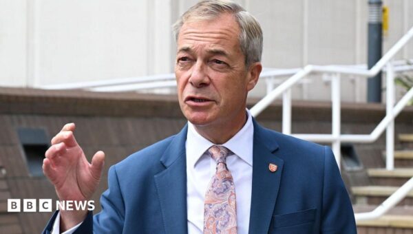 Farage defends Reform’s vetting after councillors filmed making racist comments