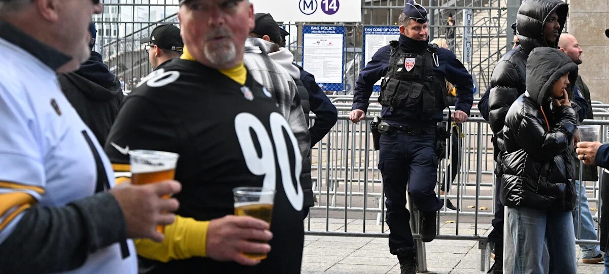 Good mood among fans attending the first NFL game in Paris, a day after protests and clashes