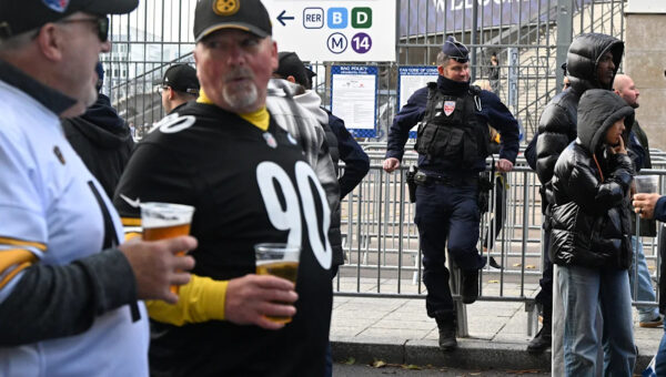 Good mood among fans attending the first NFL game in Paris, a day after protests and clashes
