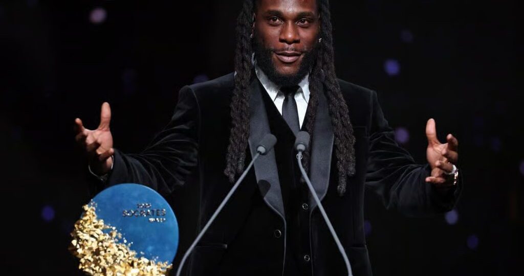 Video: Moment Burna Boy presented Socrates Award to Arsenal’s Saka
