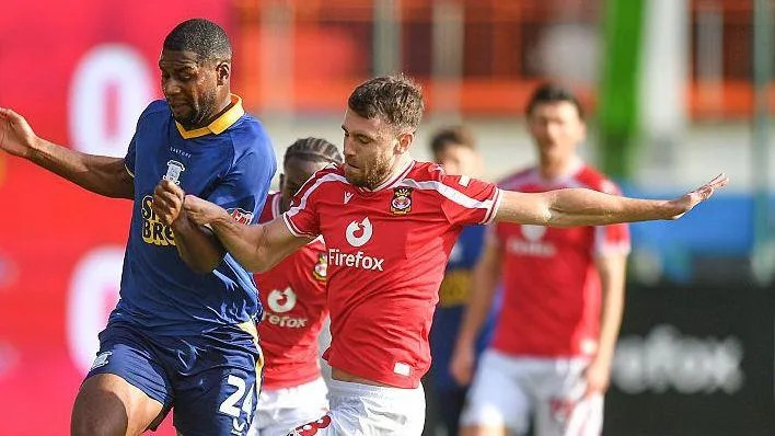 Whiteman responds to Preston boos as Wrexham ease pressure