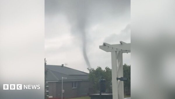 Rare tornado whips through small Australian town